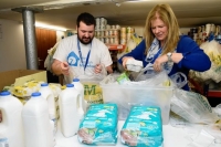 Jason Park And Susan Forman preparing parcels 